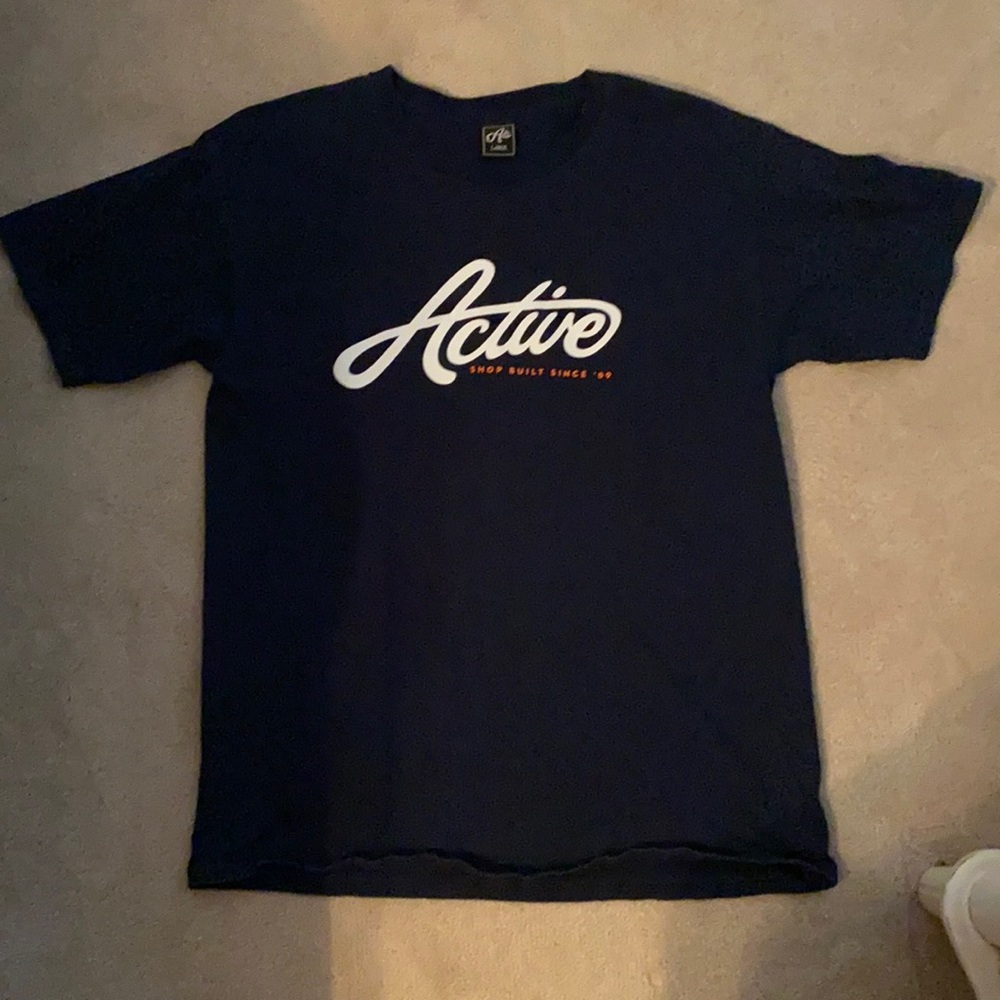 A navy blue, men’s t-shirt.